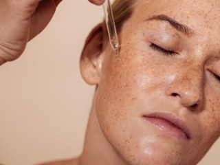 serum being applied to womans skin